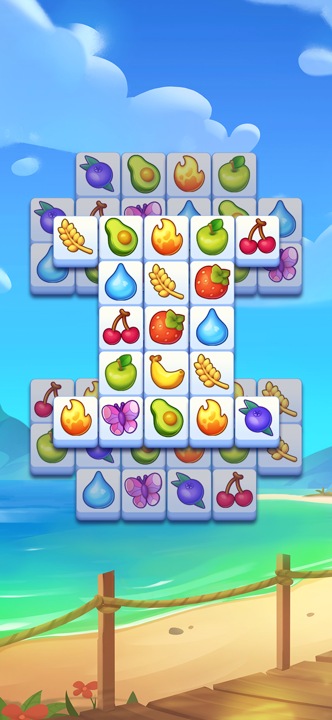 Triple Tileの海辺ステージ|ビーチを背景にタイルマッチを進める場面